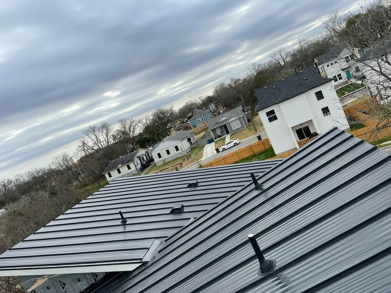 Standing seam metal roof panels with vents for Skylight Repair in Saginaw